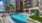 a pool in a courtyard between buildings