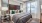 a bedroom with a large window