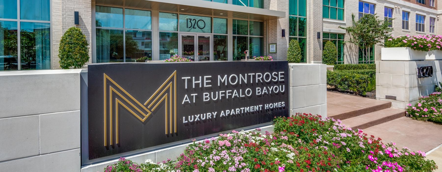 a sign in front of a building