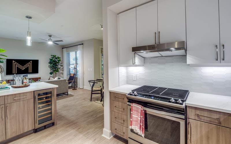 a kitchen with white cabinets