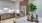 a kitchen with white cabinets