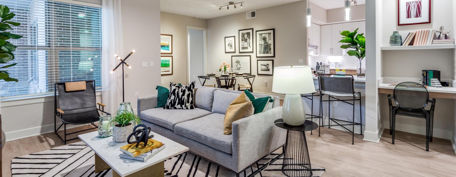 a living room with a couch and a table