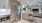 a kitchen with a refrigerator and stove