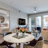 living room with a large window and open spaces