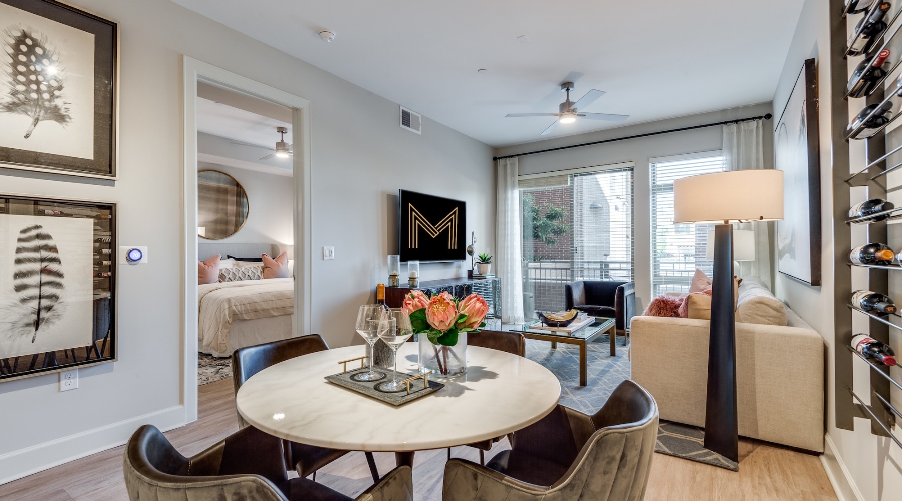 Contemporary & Sophisticated living room with a large window and open spaces