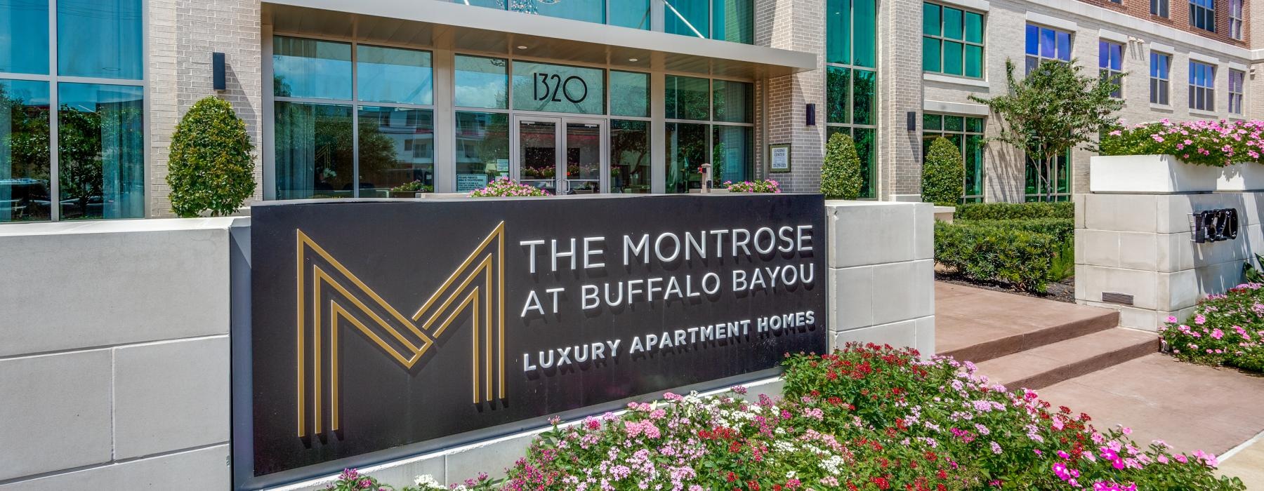 a sign in front of a building