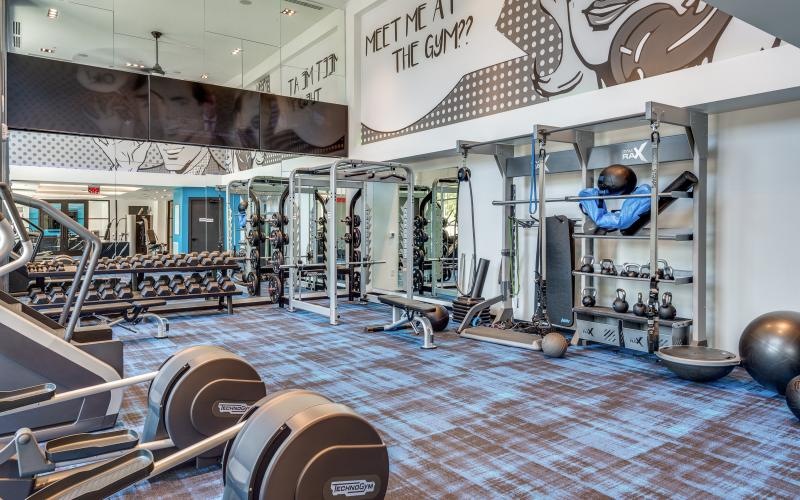 a room with weights and equipment