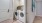 a room with a washing machine and a dryer