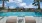 a pool with a city in the background